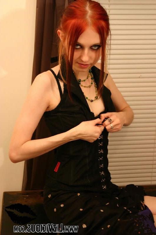 14P Redhead goth chick strips and poses