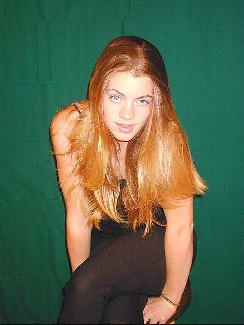 18P Fiery redhead teen stripping and posing