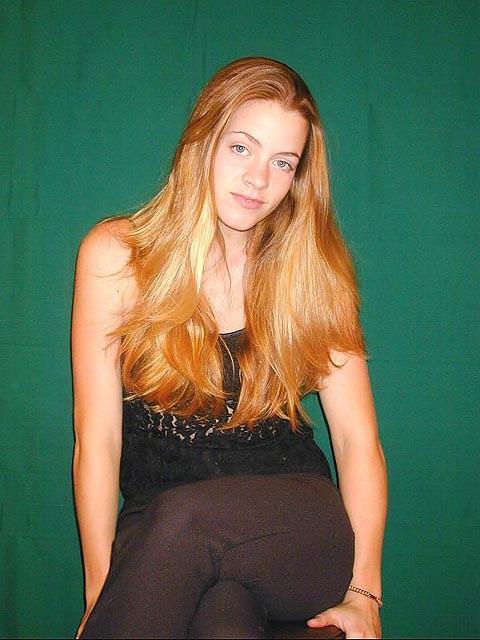 18P Fiery redhead teen stripping and posing