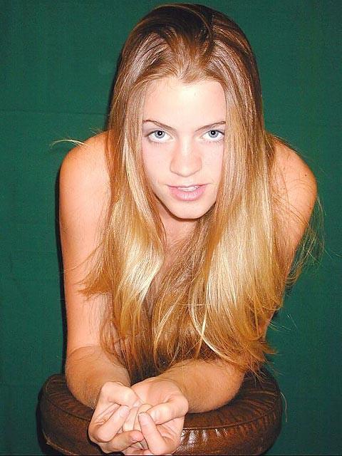 18P Fiery redhead teen stripping and posing
