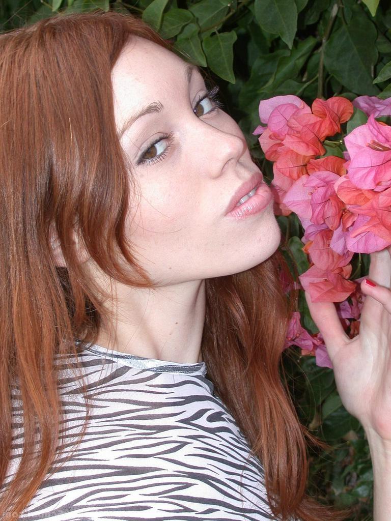 15P Redhead teen shows off her furry pussy on the beach