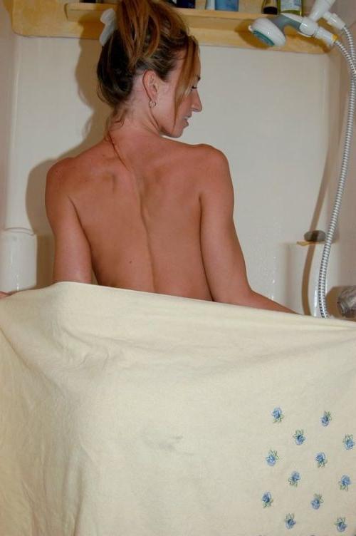 16P Cute coed taking a shower