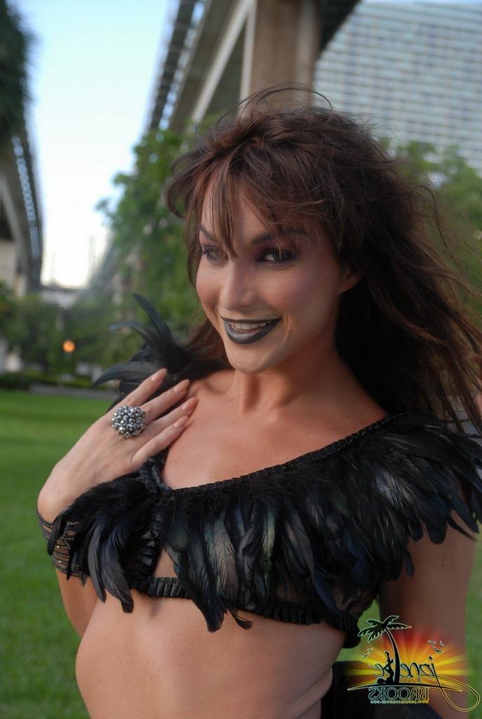 12P Beautiful Jonelle Brooks poses in a hot dress
