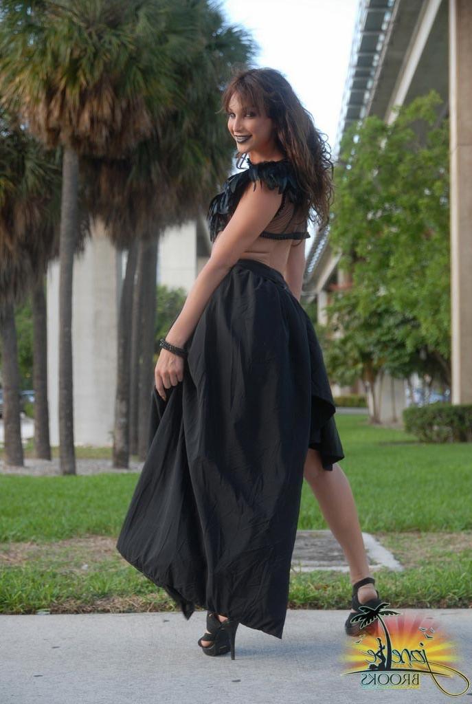 12P Beautiful Jonelle Brooks poses in a hot dress