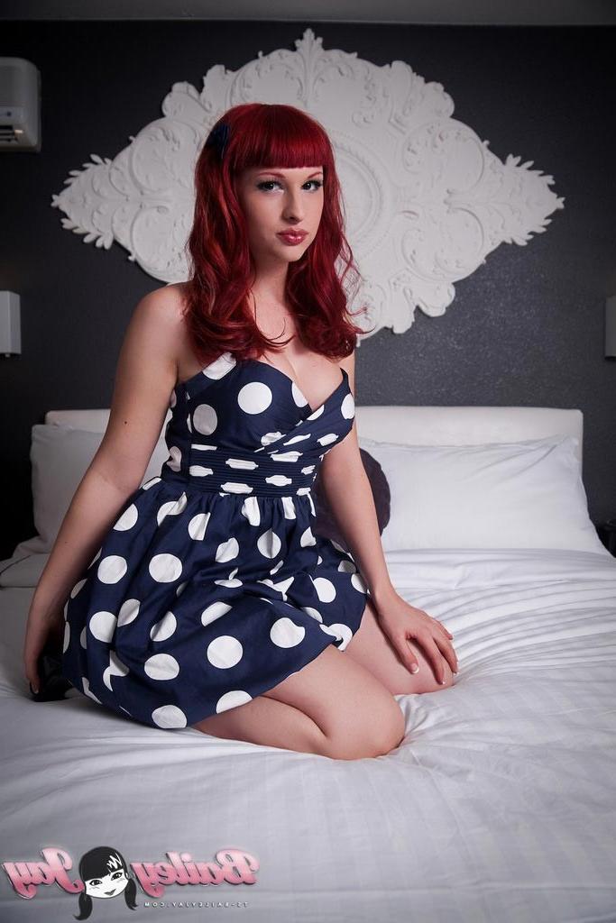 12P Redhead tgirl Bailey Jay posing her big cock