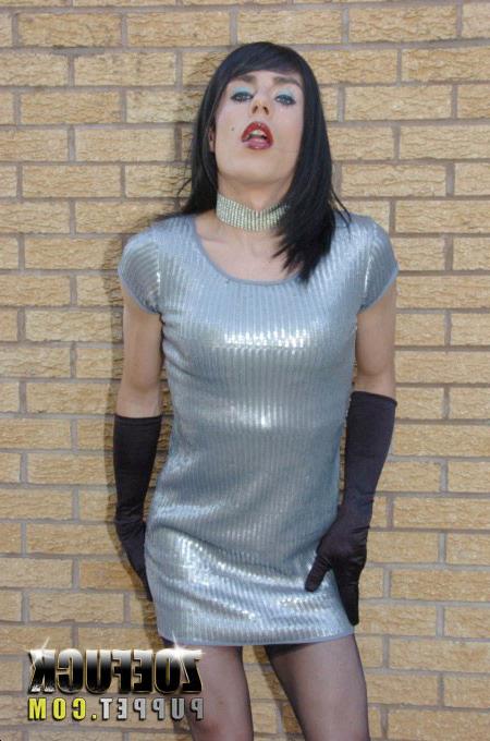 16P Transvestite Zoe in silver dress