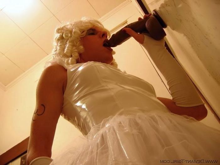 16P Transvestite in white petticoat sucking a big dick