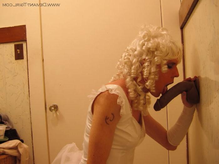 16P Transvestite in white petticoat sucking a big dick