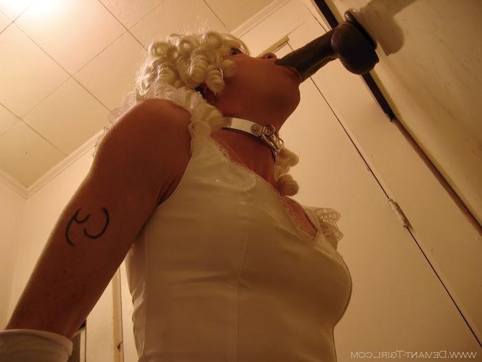 16P Transvestite in white petticoat sucking a big dick