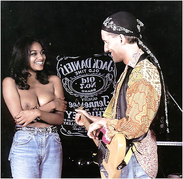 15P Dark groupie girl giving herself to two musicians