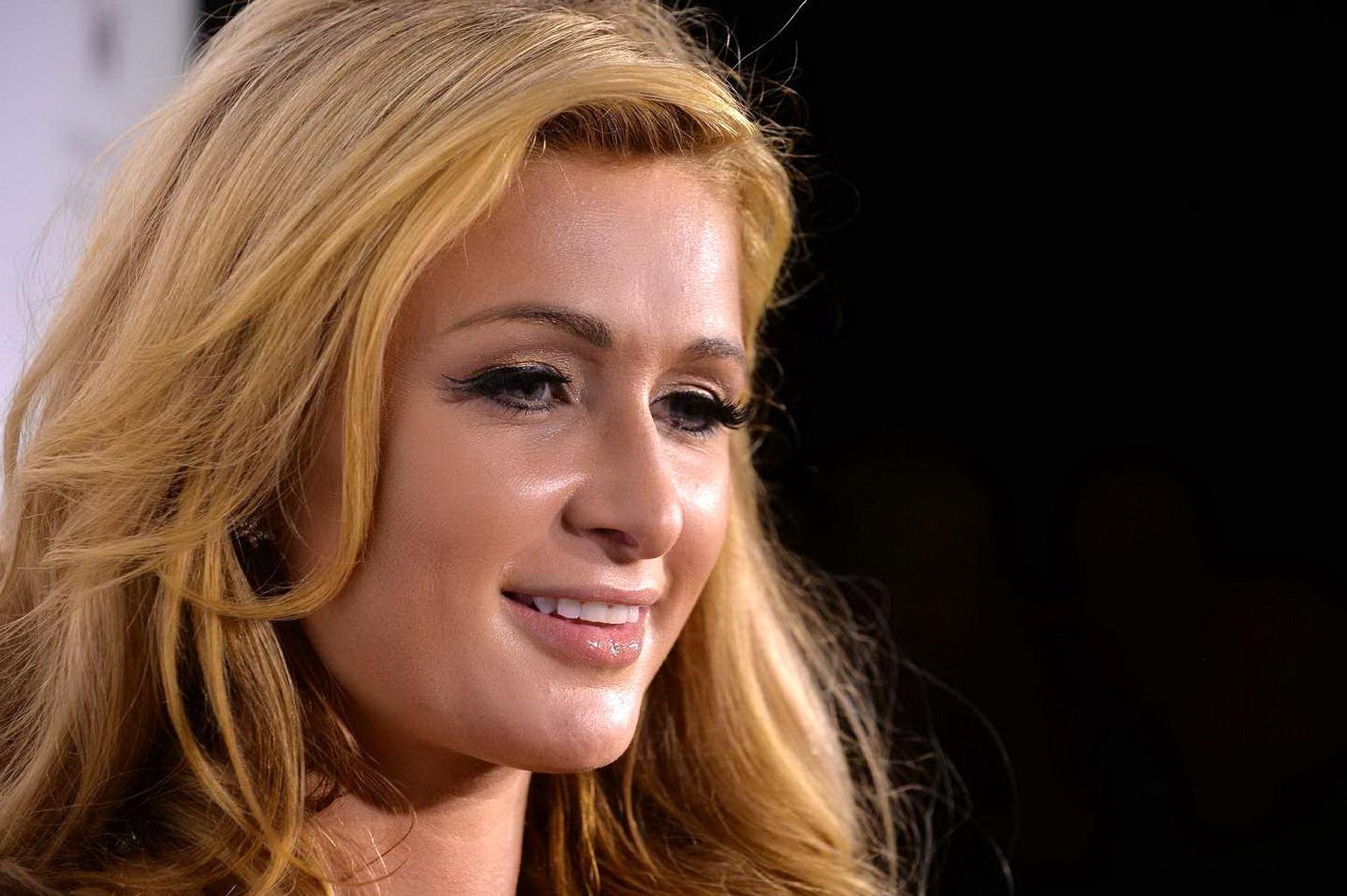 15P Paris Hilton showing huge cleavage at Wall Lounge during Art Basel in Miami Beac