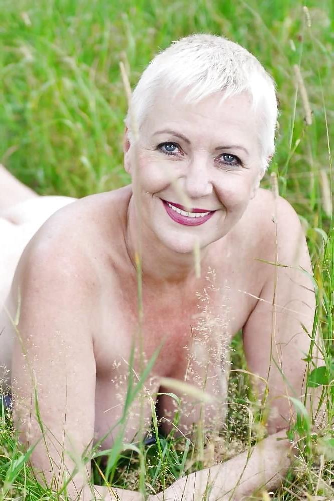 16P Gorgeous short haired smiling granny