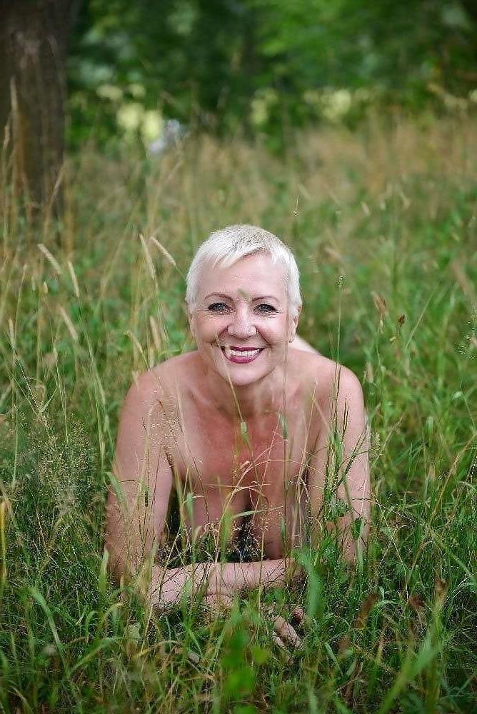 16P Gorgeous short haired smiling granny