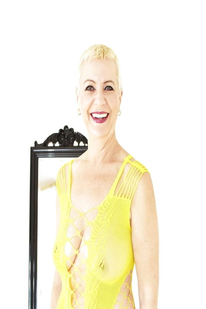 16P Gorgeous short haired smiling granny