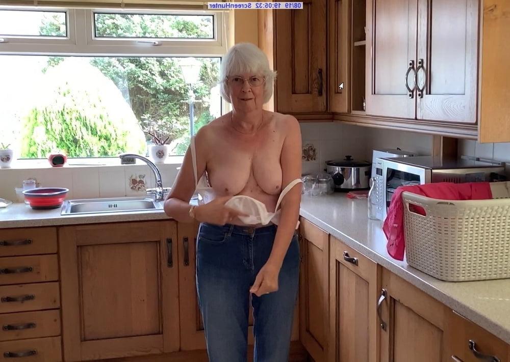 6P Kay goes topless in her kitchen