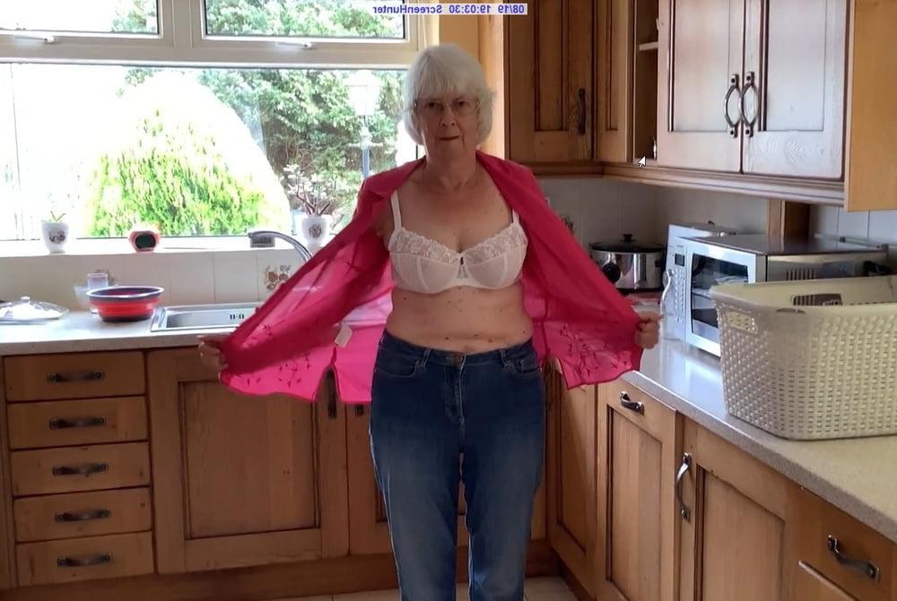 6P Kay goes topless in her kitchen