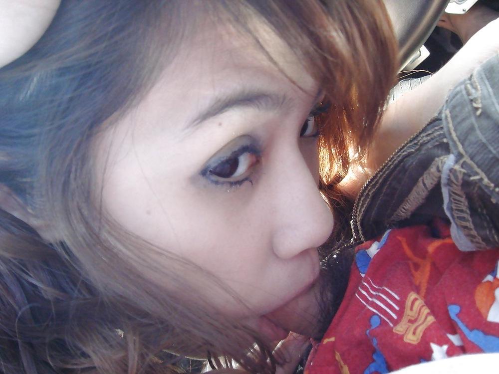 15P Asian Girlfriend On Vacation Giving A Blowjob In The Car 