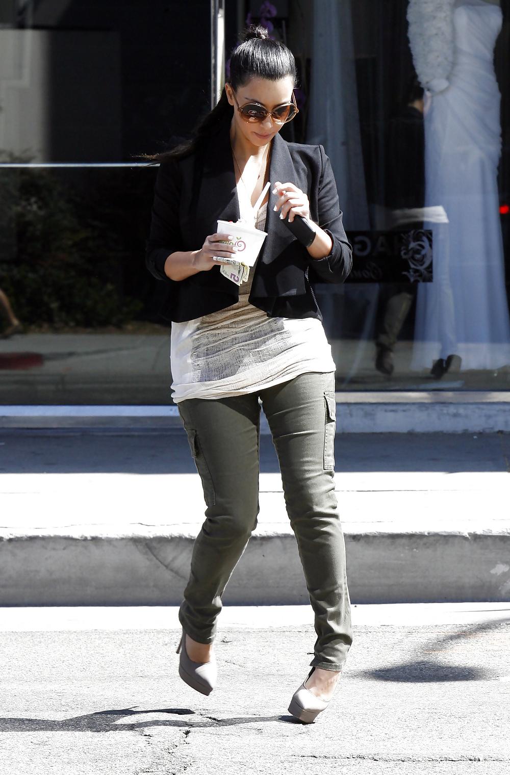 16P Kim Kardashian cleavy in black headed to Katsuya Restaurant