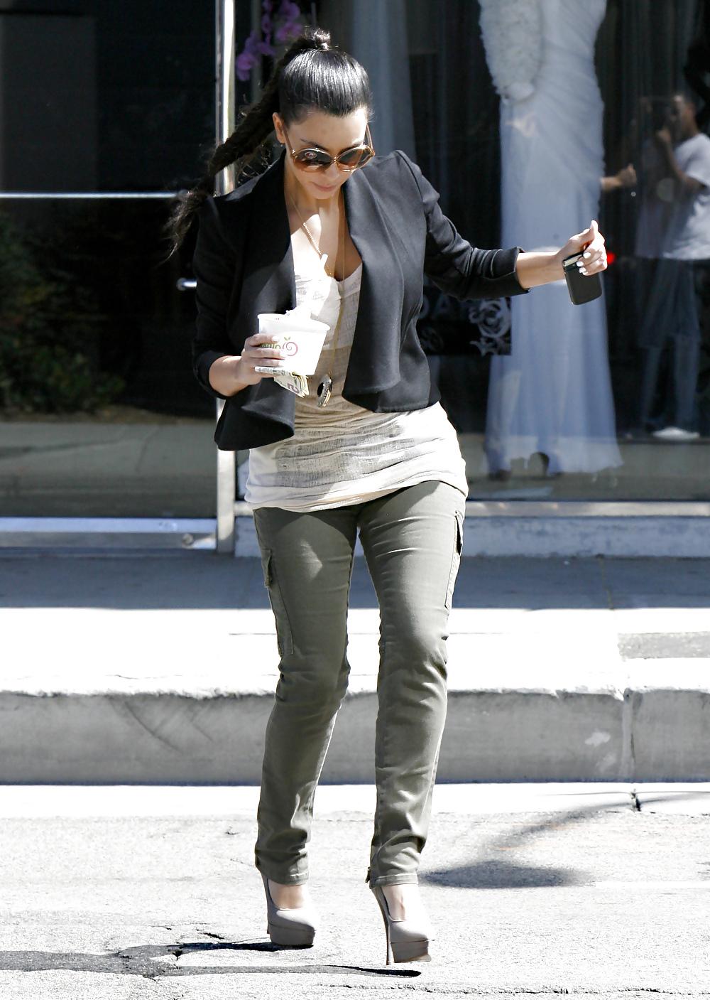 16P Kim Kardashian cleavy in black headed to Katsuya Restaurant
