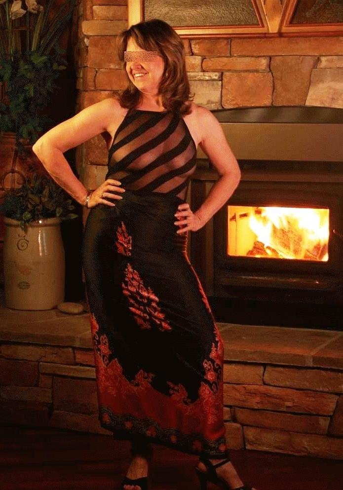 25P romantic matures in front of fireplace 4