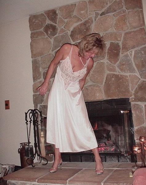 25P Romantic matures in front of fireplace