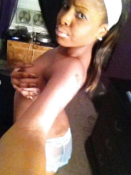 9P Tatoo Peirced Hondurian Black Girl