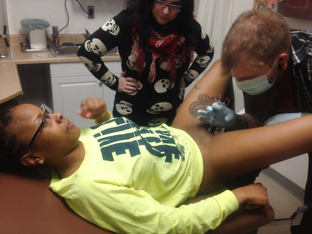 9P Tatoo Peirced Hondurian Black Girl