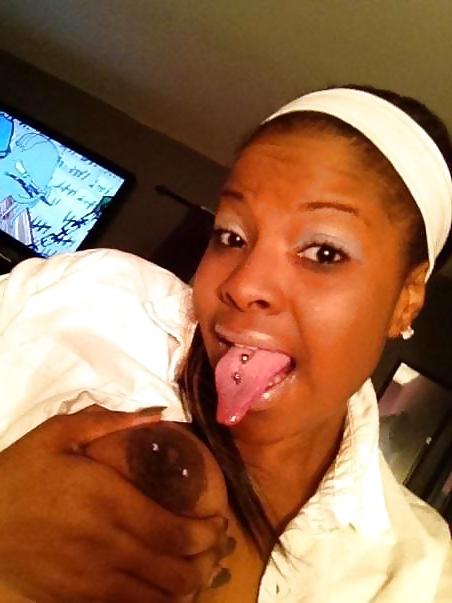 9P Tatoo Peirced Hondurian Black Girl