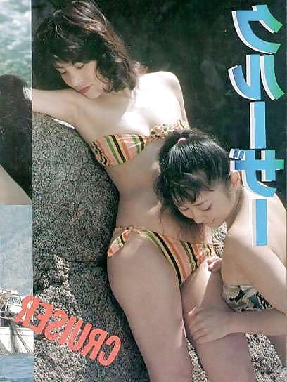 25P Two asian girls getting frisky with each other