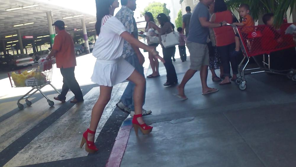 25P Cute girls ass & butt in short white mini skirt & red shoes