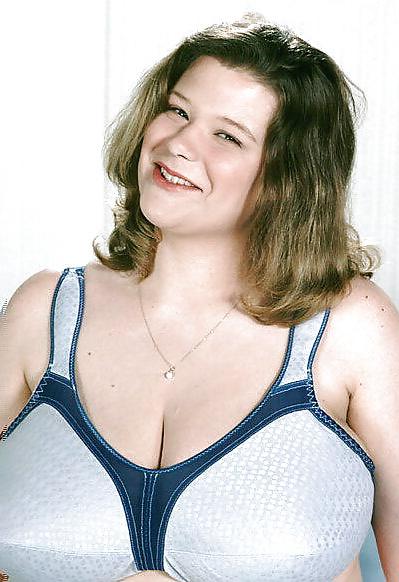 25P Busty dark-blonde BBW posing her ample assets