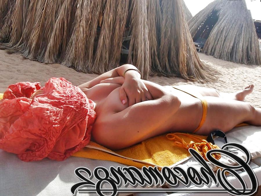 14P Voyeur chubby showing tits on beach