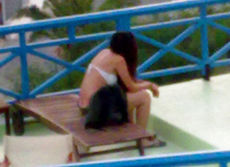 25P Greek women summer and beach