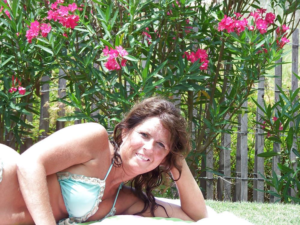 23P Mature bikini.
