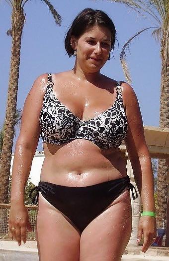 23P Mature bikini.