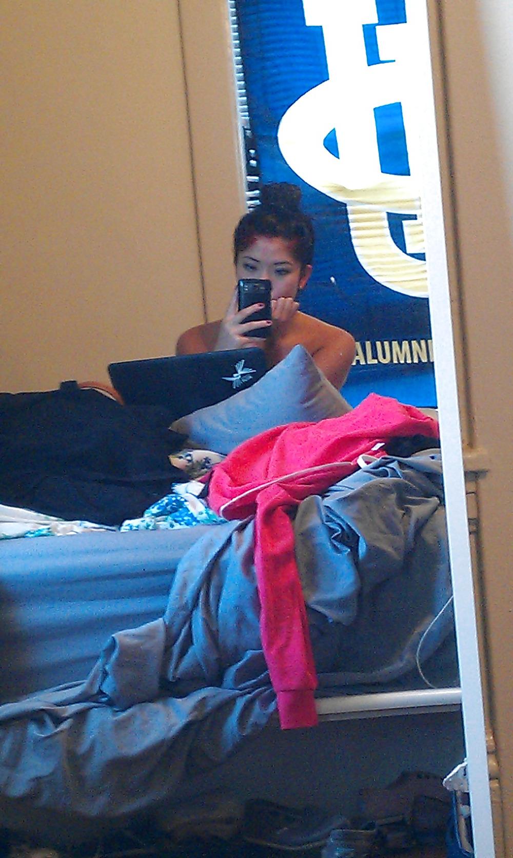 25P A Splendid Asian Girl in Her Home.