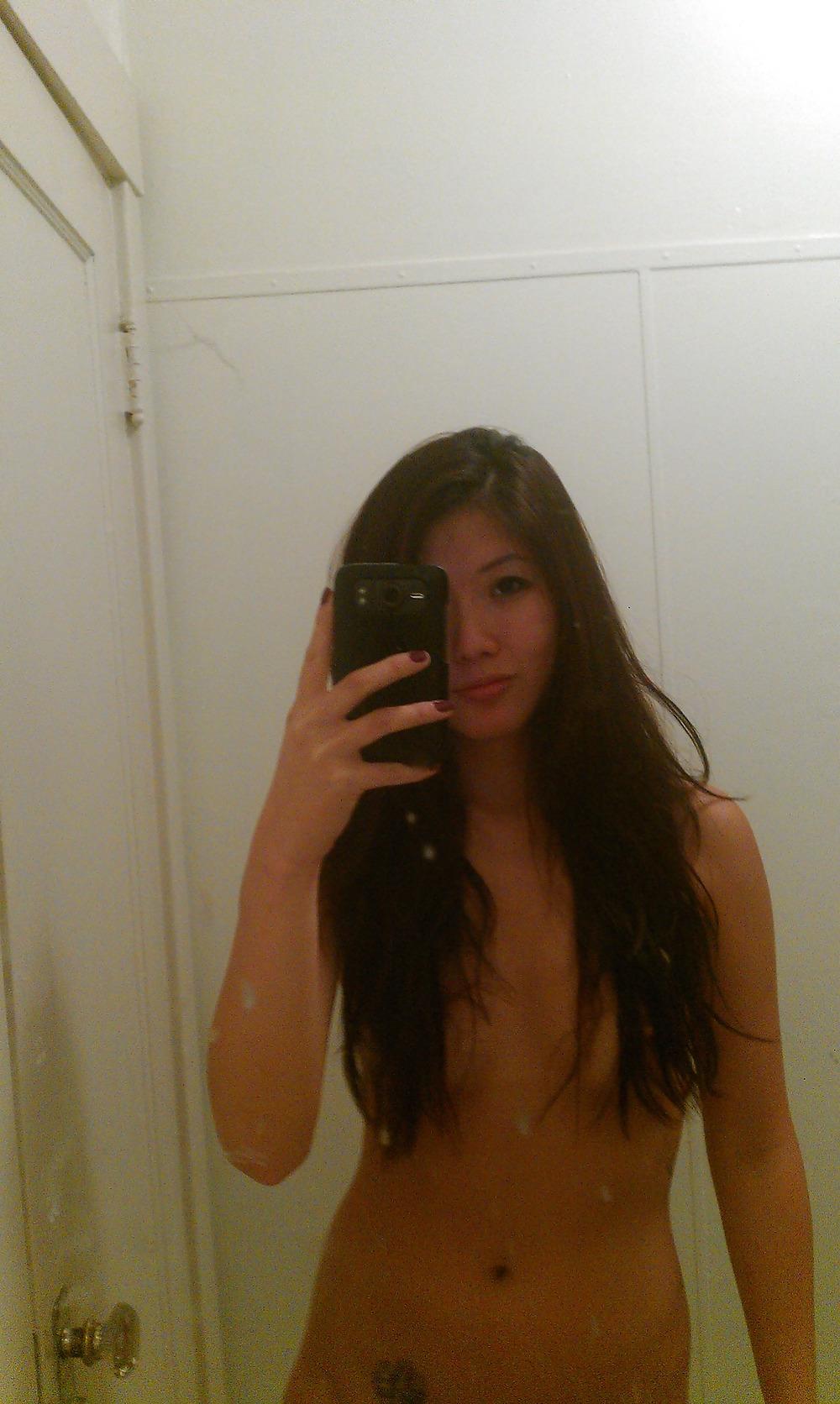 25P A Splendid Asian Girl in Her Home.