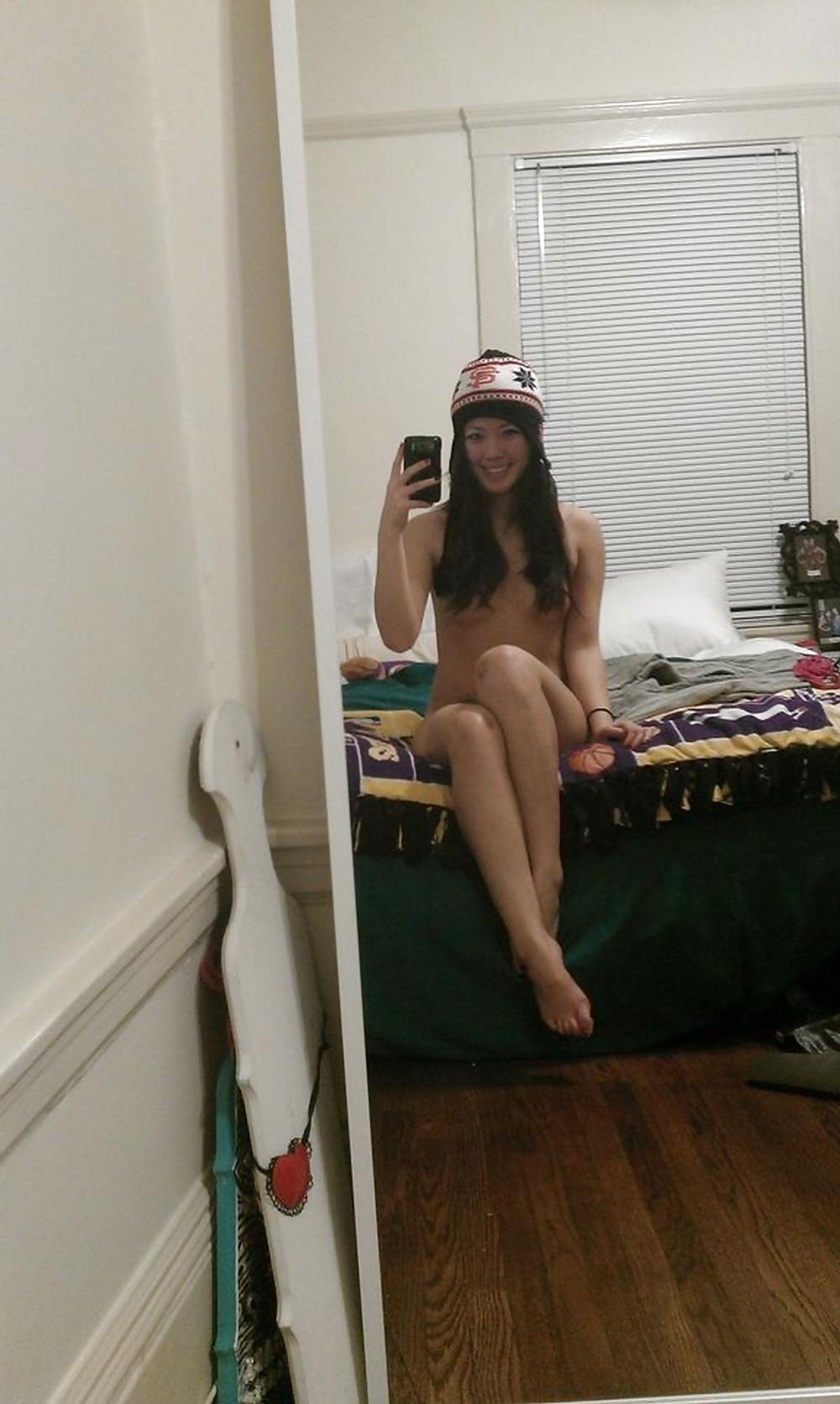 25P A Splendid Asian Girl in Her Home.