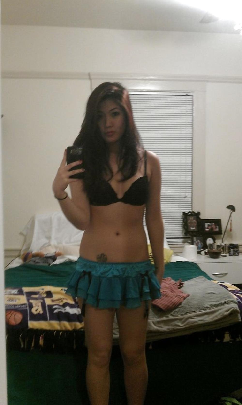 25P A Splendid Asian Girl in Her Home.
