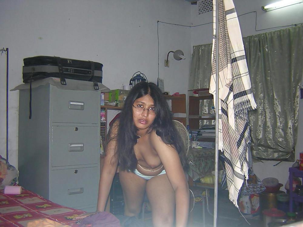 25P Young asian gets her tits out