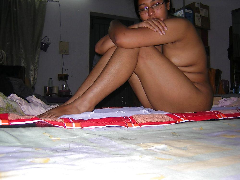 25P Young asian gets her tits out
