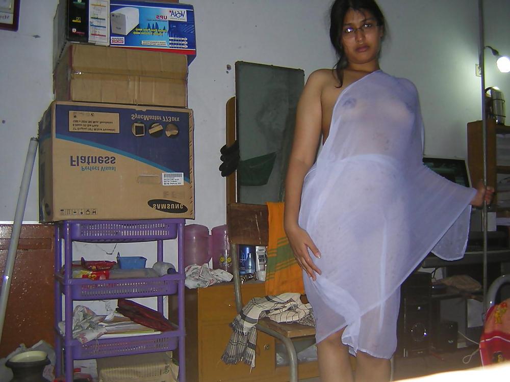 25P Young asian gets her tits out