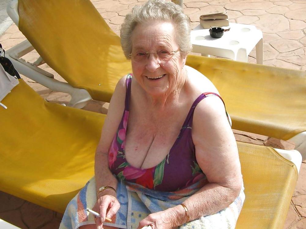 25P Old granny at beach 
