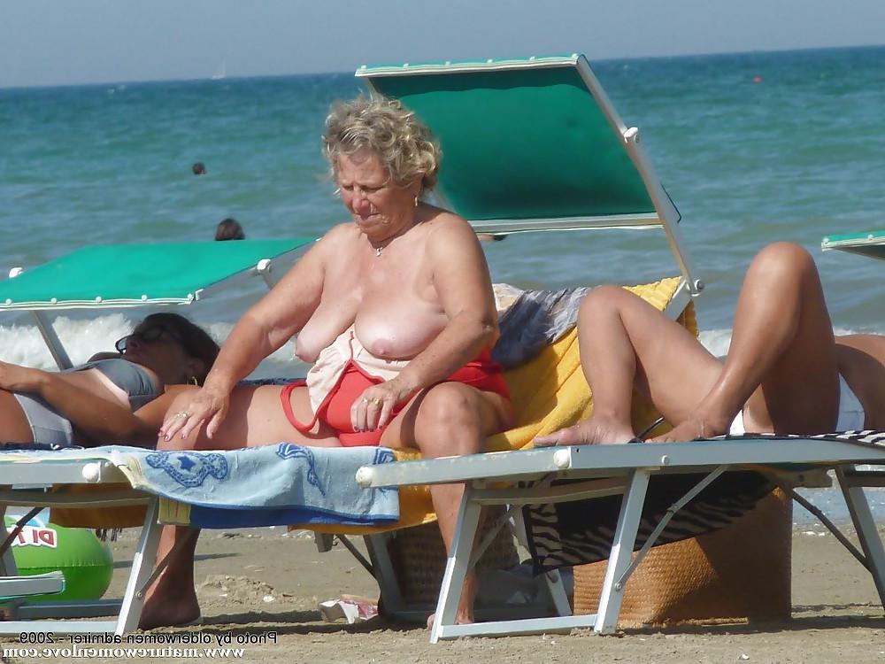 25P Old granny at beach 