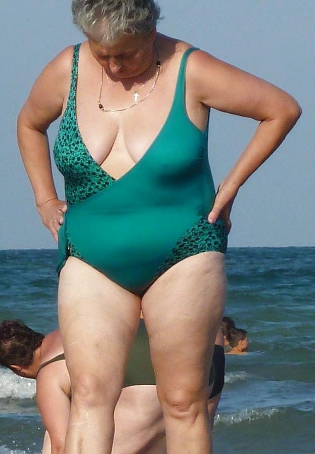 25P Old granny at beach 