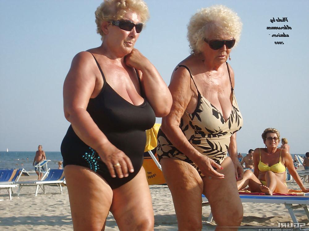 25P Old granny at beach 