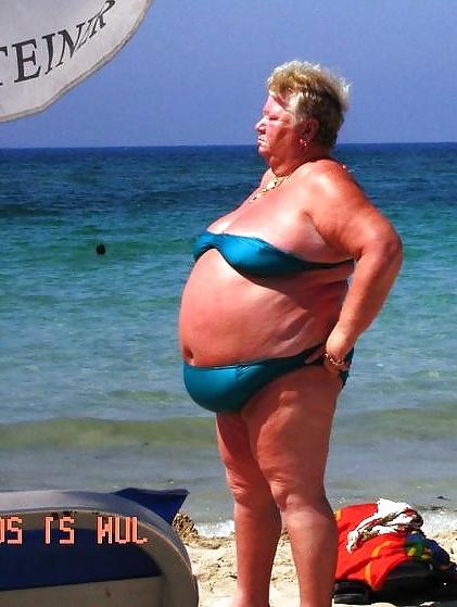 25P Old granny at beach 