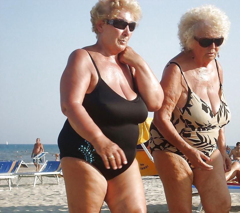 25P Old granny at beach 