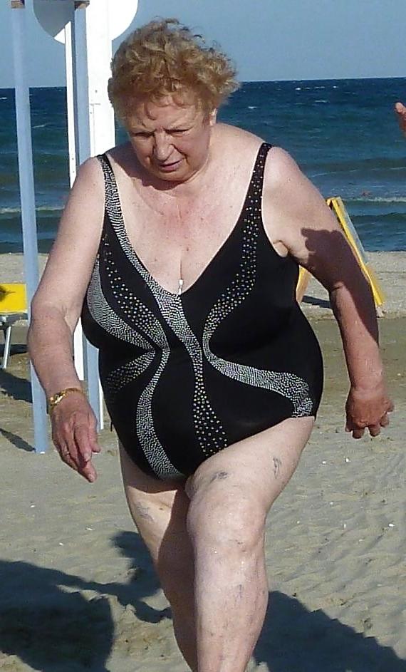 25P Old granny at beach 