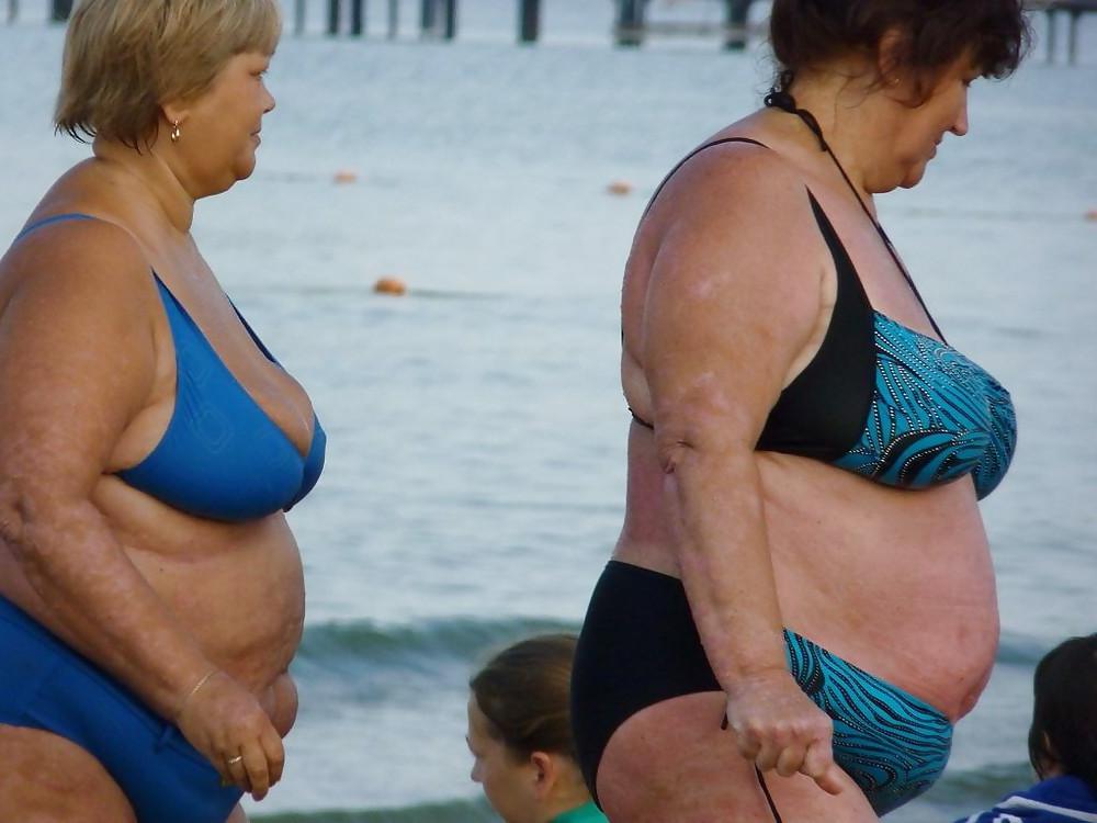 25P Old granny at beach 